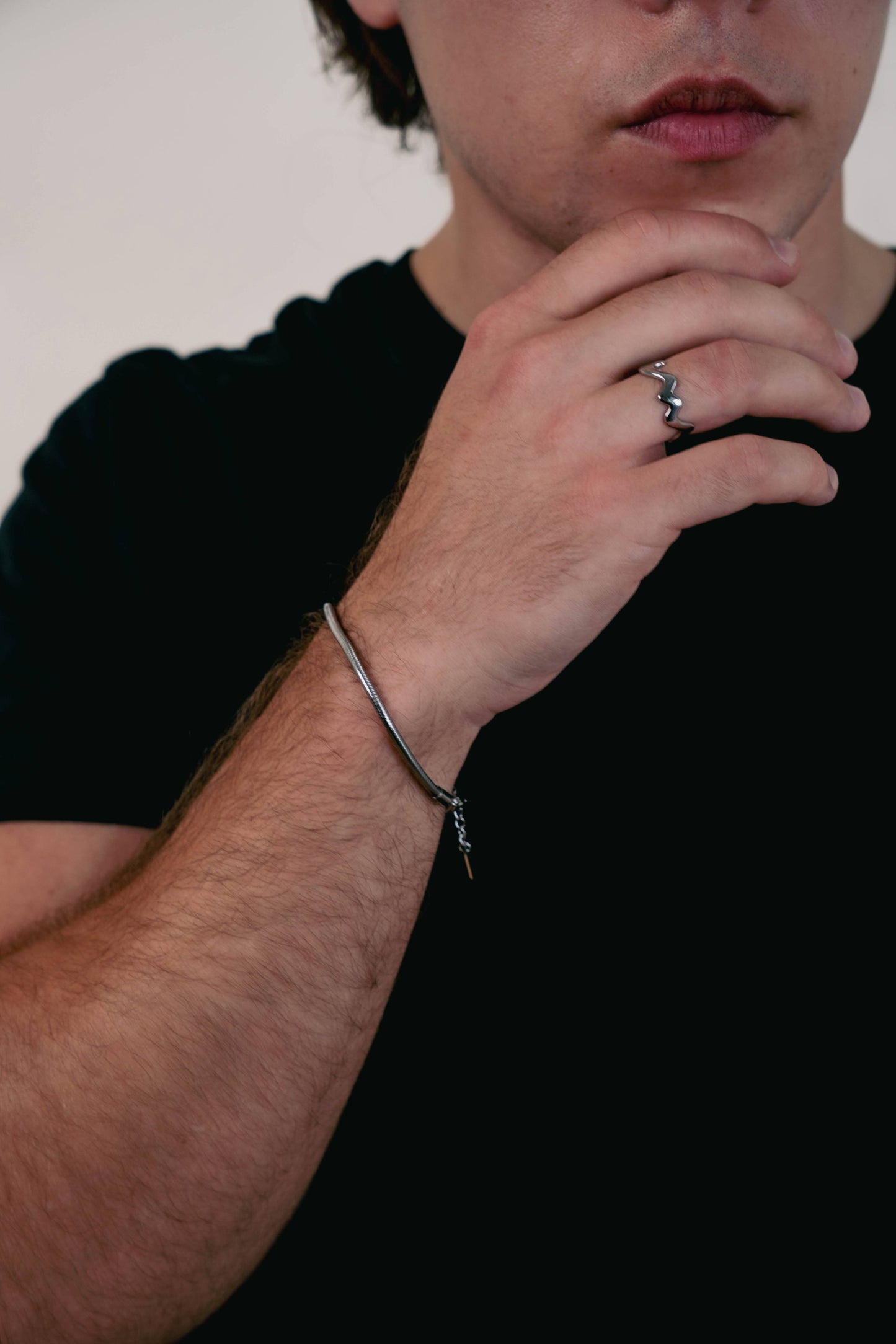 EXCITÀRE Ember Ring silver styled with the Figaro silver bracelet.