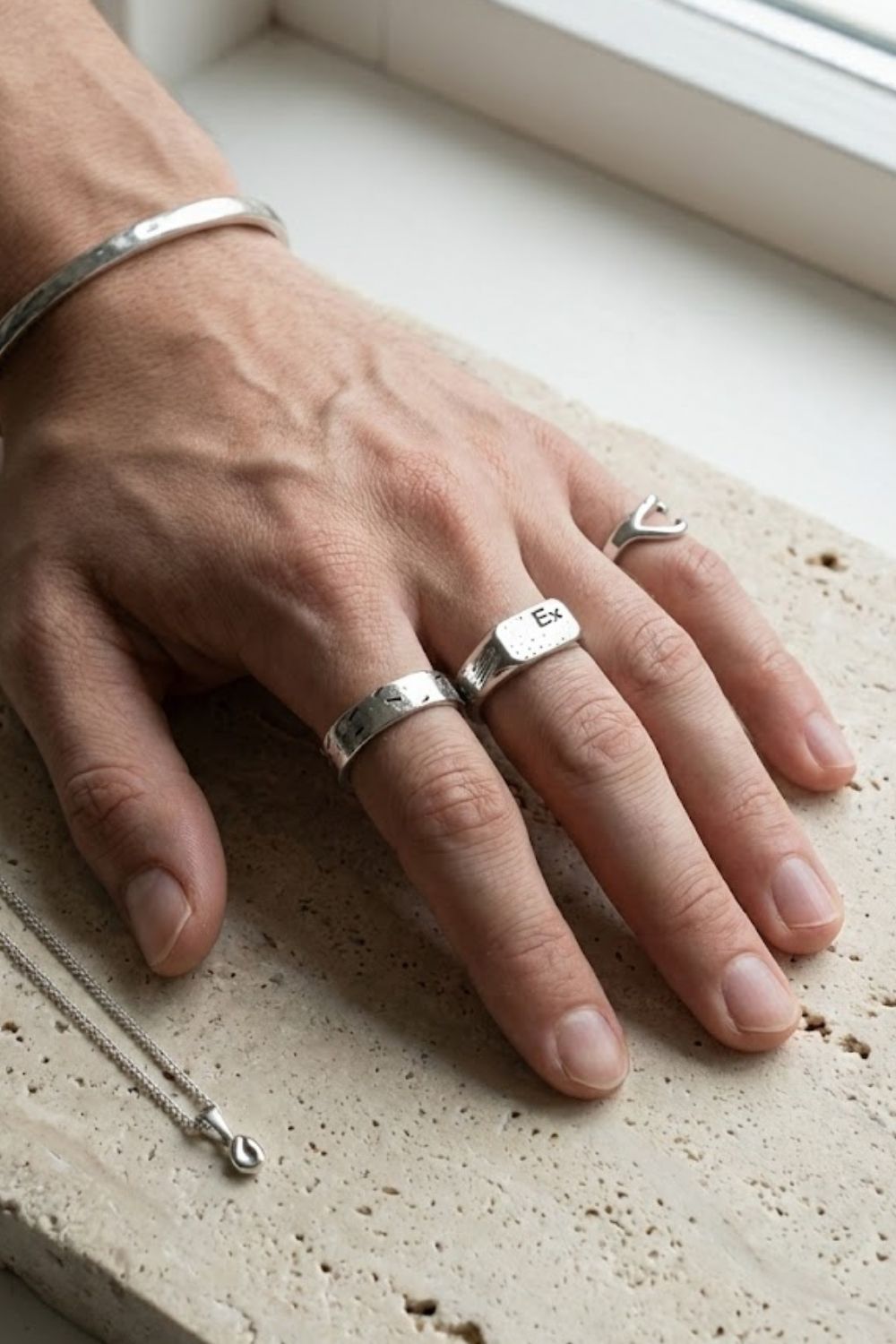 How Much Jewelry Should a Man Wear? The 3-2-1 Rule