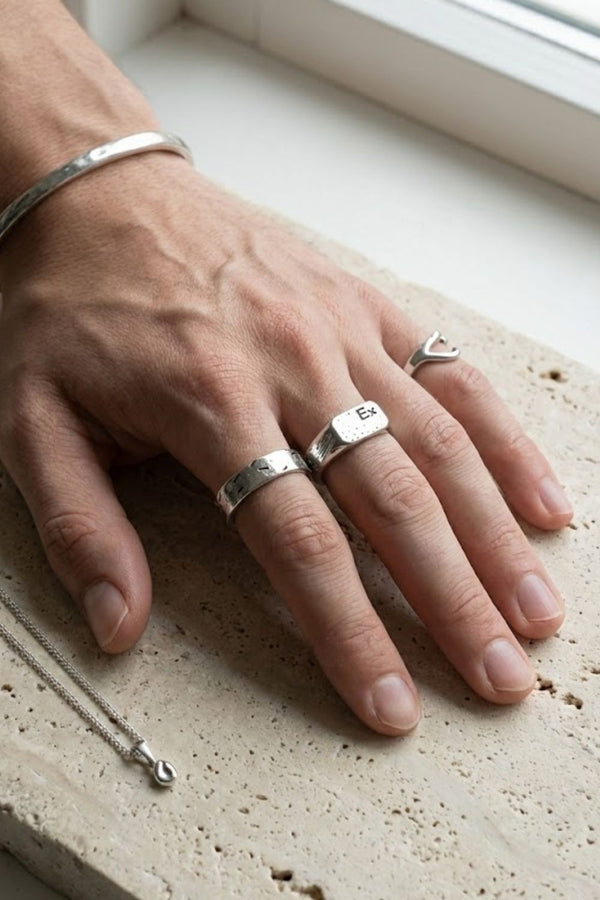 How Much Jewelry Should a Man Wear? The 3-2-1 Rule