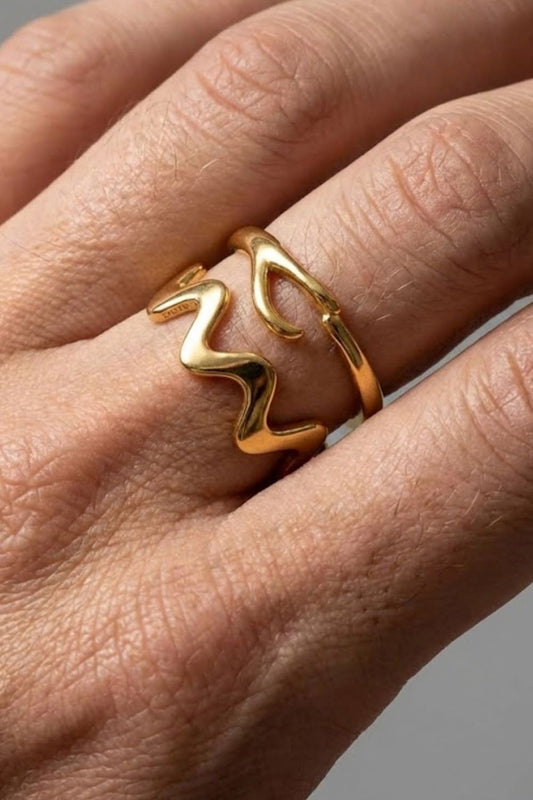 
  Ember Wave ring combined with the Ellis ring on model hand. 
